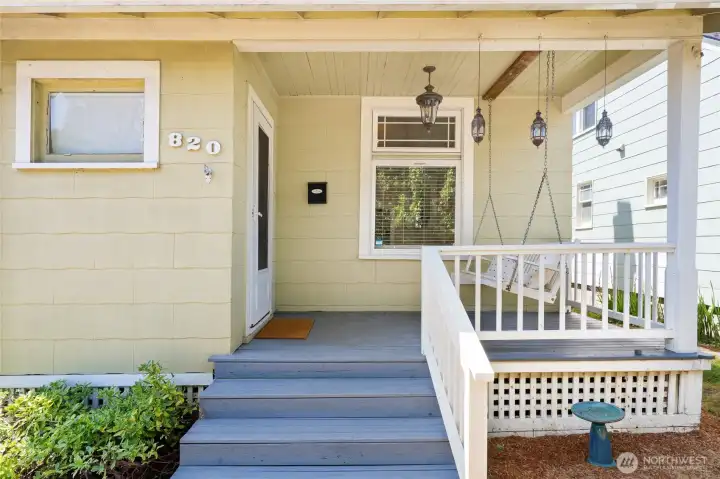 Classic front porch, complete with swing. Classic front porch, complete with swing.