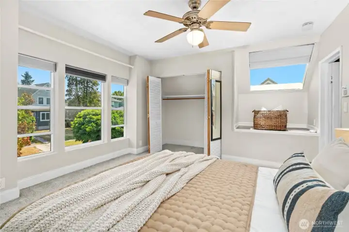 Primary bedroom- full of natural light! Primary bedroom- full of natural light!