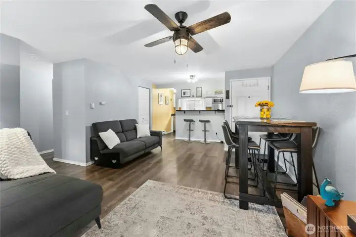 Open-concept kitchen, dining, and living areas create a bright, spacious setting perfect for everyday living and entertaining.