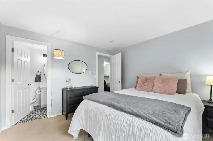 Primary bedroom with attached full bathroom