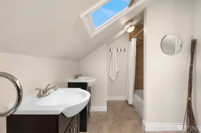 Upper level loft, full bath.