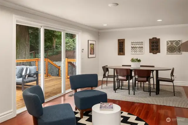 The thoughtful floor plan allows the kitchen to flow seamlessly to the casual dining area and gas fireplace seating area for enjoying morning coffee/tea. Sliding door for access to the large deck.