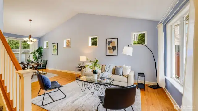 Spacious open living area showcasing beautiful hardwood floors that add timeless elegance and warmth to the space