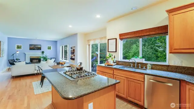 Enjoy a great room design in this home with open sight lines from the kitchen to the living room, offering casual dining space in between.