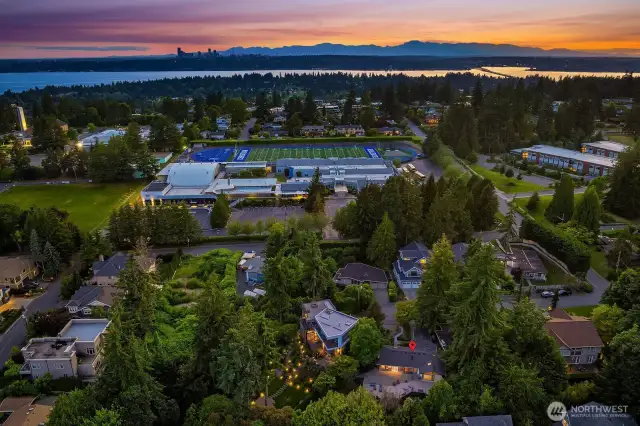 This aerial shows the proximity to great schools, Puget Sound, Seattle city skyline, and the Olympic Mountains.