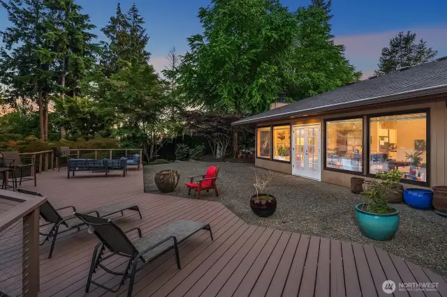 Open floor plan opens to expansive patio and deck - perfect for entertaining.