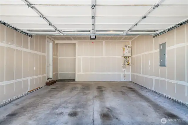 Two car garage with extra storage/shop