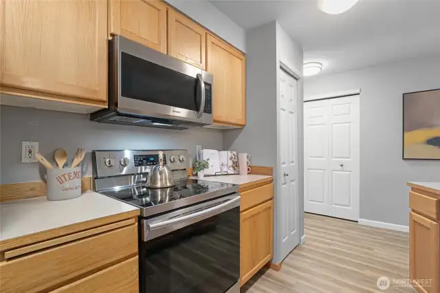 Kitchen and SS range, oven, and microwave