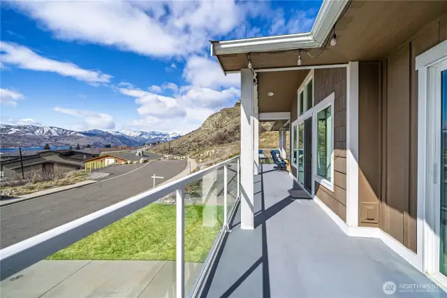 73’ of cement board deck with 5’x12’ covered Alcove overlooking Lake Chelan against mountain view backdrops.