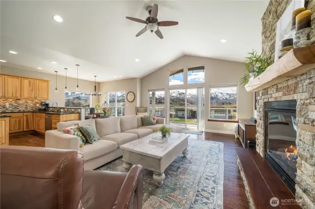You'll love the fireplace & beautiful mantle, the views and the sunshine streaming in.