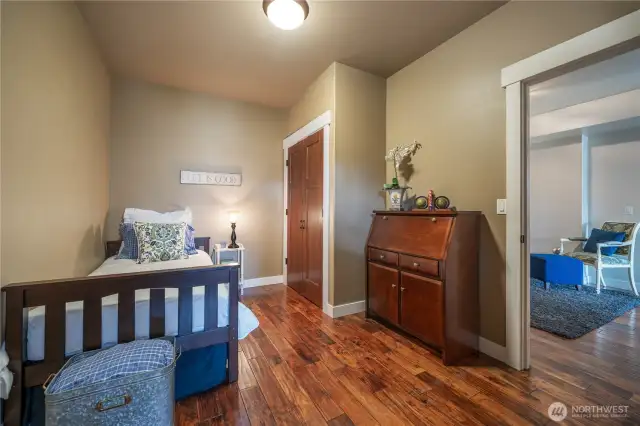 The 2nd bedroom on the main complete with a door to the outside.