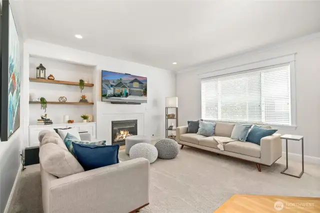 Lovely Living Room Featuring a Gas Fireplace