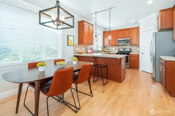 Light Filled Dining & Kitchen w Gleeming Hardwood Floors - Walk-in Pantry