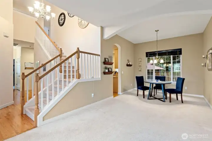 Tall ceilings through out and beautiful staircase