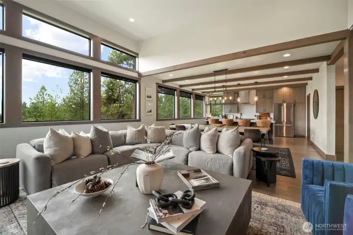 Cozy up everyone and enjoy this light filled great room