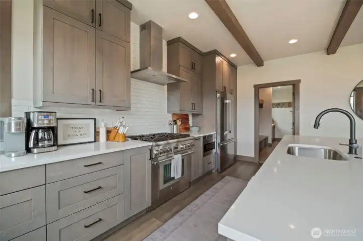 This kitchen has everything you need and want - counter space, cabinets, top of the line appliances and more
