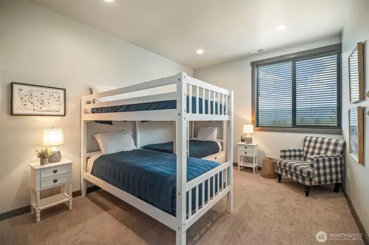 First bedroom you find upstairs is an adorable bunk room - cozy and sweet
