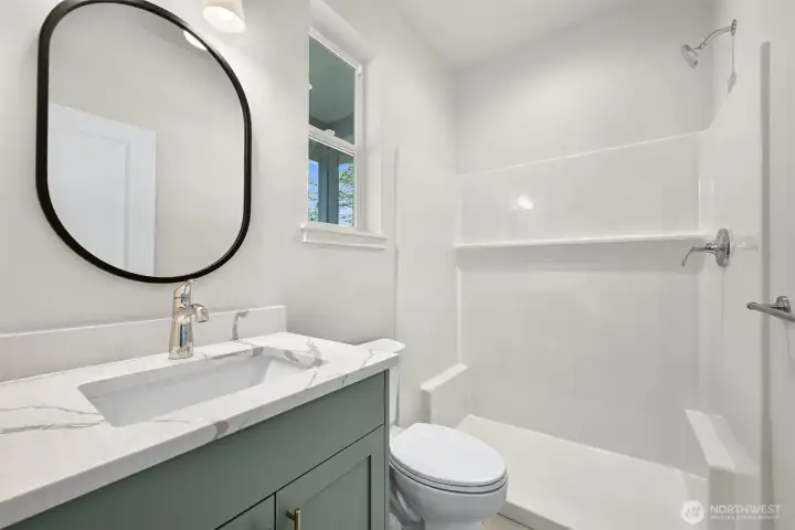 Main floor bathroom with shower