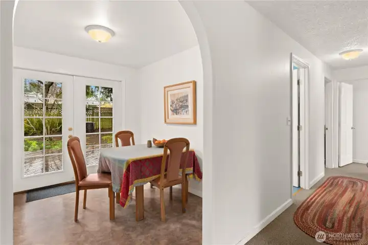 Hall way and dining area. Double French door to the back deck.