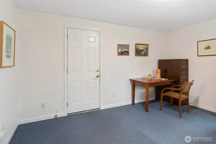 Family room and door to the garage.