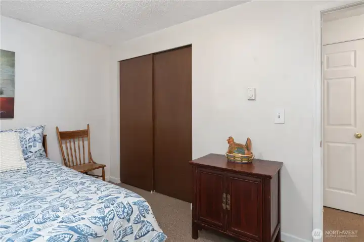 Primary bedroom. Hall linen closet is barely visible.