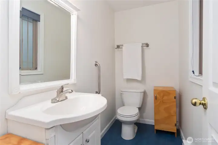 Primary half bath, freshly painted.