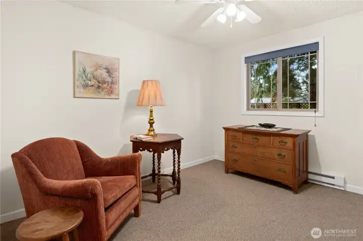 Third bedroom has a ceiling fan with light.