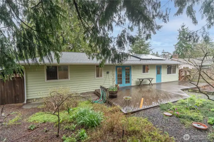 View of the back of the house with the solar panels installed in 2024. Roof installed in 2024 too.
