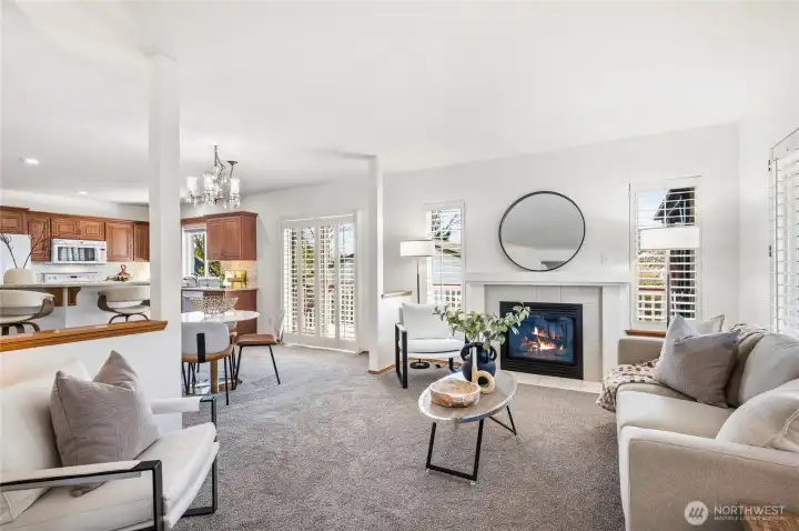 Spacious open plan great room, dining nook, and kitchen. New carpet, and fresh paint!