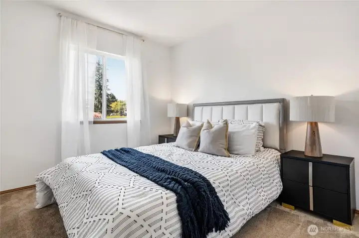 Additional sunlit bedroom.