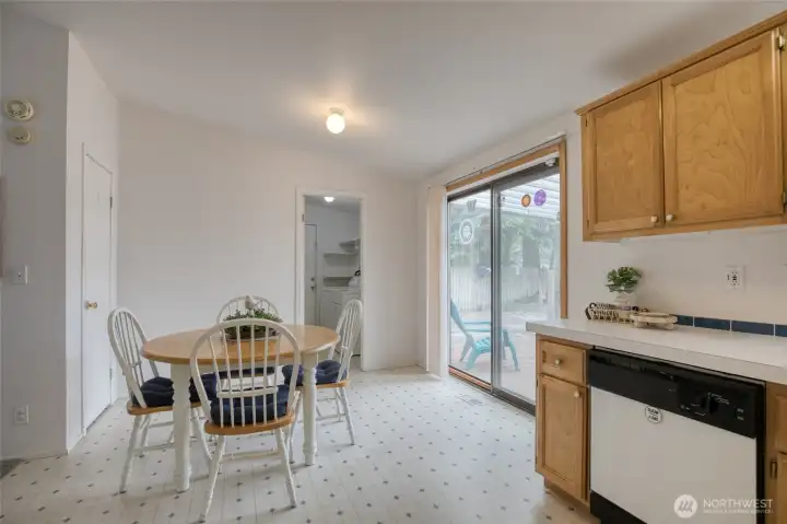 Comfortable dining room with access to the backyard