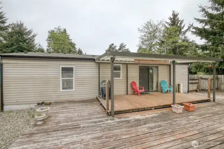 Covered deck allows you to enjoy the backyard even when it's raining