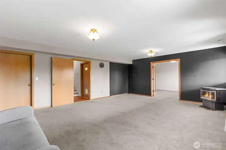 Door to the left leads the garage.  Door to the right leads upstairs.  Through this space is a storage room!