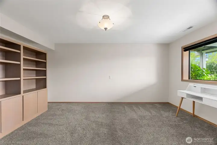 Den off of lower family room.