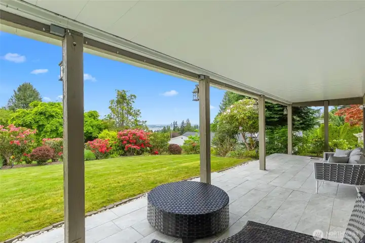 Enjoy being outdoors year round with the tiled covered patio.