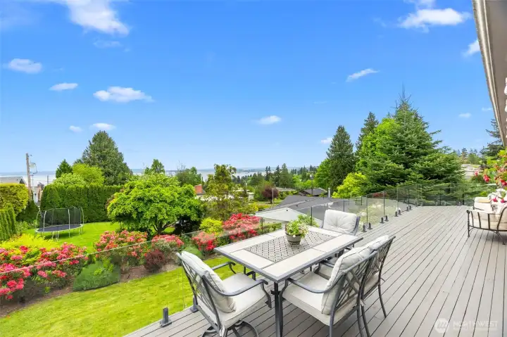 High end CUSTOM frameless deck railing has an extensive lighting system for you to enjoy at nighttime.