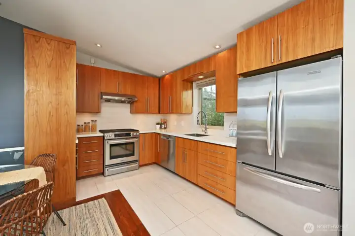 Walnut cabinets, stainless appliances, thoughtful design. Walnut cabinets, stainless appliances, thoughtful design.