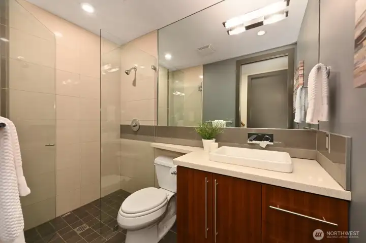 Beautiful 3/4 bath with walk-in shower, heated tile floors. Beautiful 3/4 bath with walk-in shower, heated tile floors.