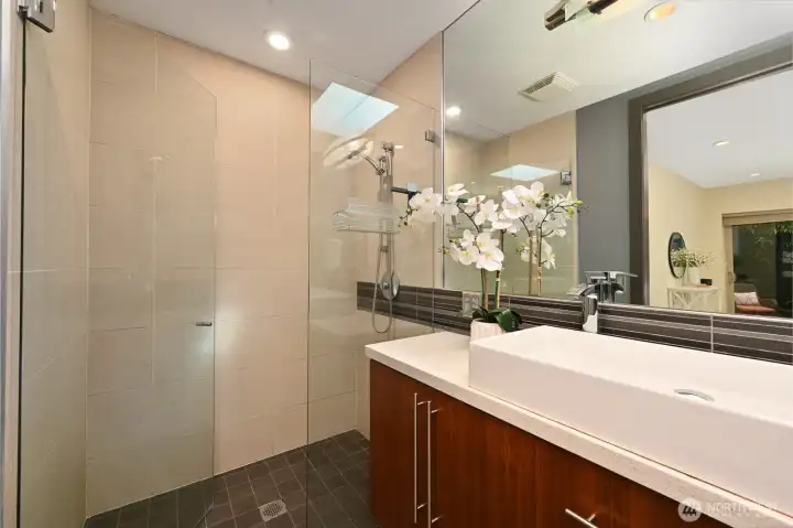 Walk in shower, heated floors & designer colors. Walk in shower, heated floors & designer colors.