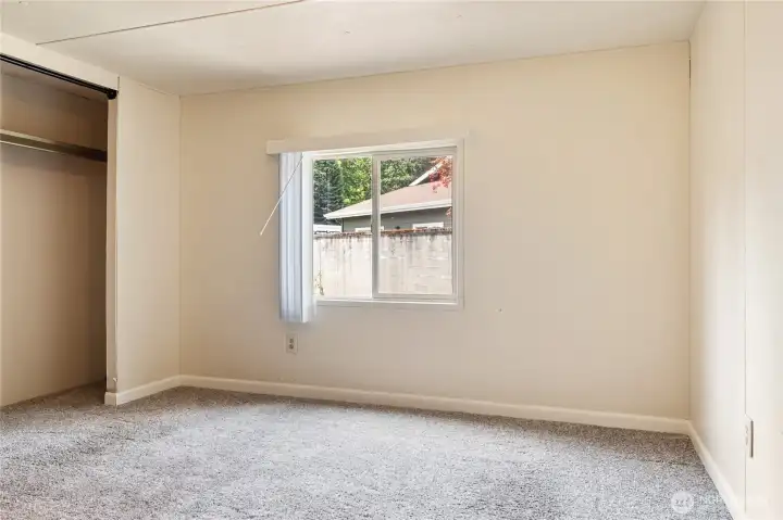 Primary bedroom with closet