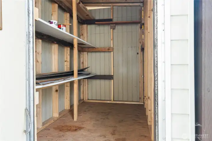 Storage shed with lock.