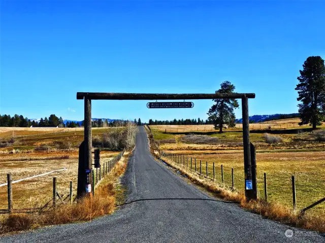 As you drive up Iron Mountain Road and see this overhead ranch sign, lots 3 & 4 are off to the right side