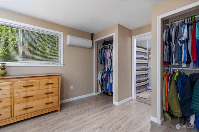 Primary bedroom with dual closets