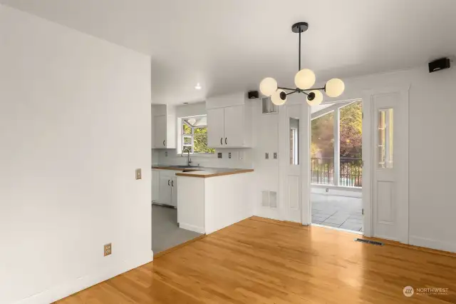 Dining room leading out to the sunroom.