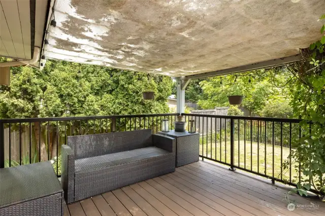 Back deck great for relaxing by the pool.