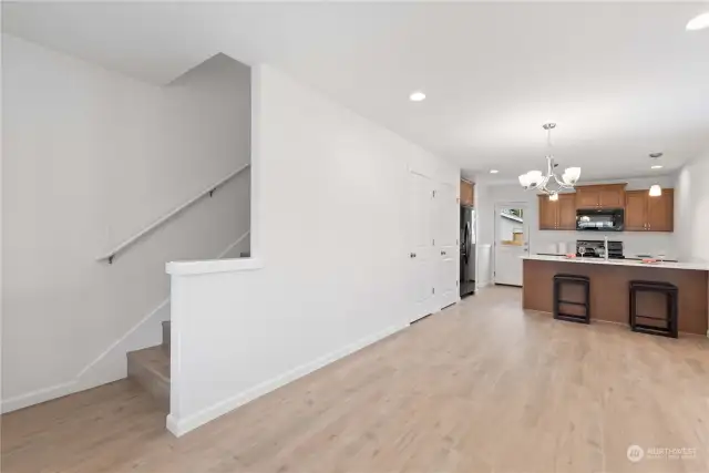 The stairway leads to the upper level with 2 bedrooms and full bath.