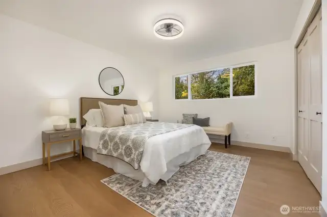 Additional upstairs bedroom equipped with stunning hardwoods and great closet space.