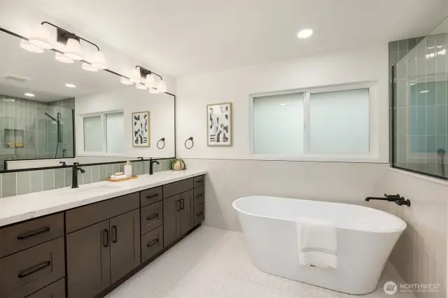 Can you imagine a bubble bath after a long day at work in this gorgeous soaking tub? Pure bliss.