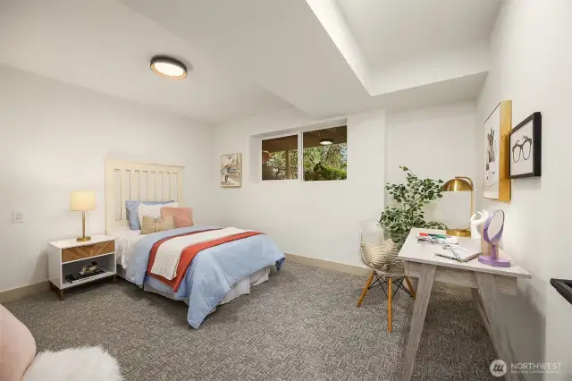 One of the two downstairs bedrooms. Darling.
