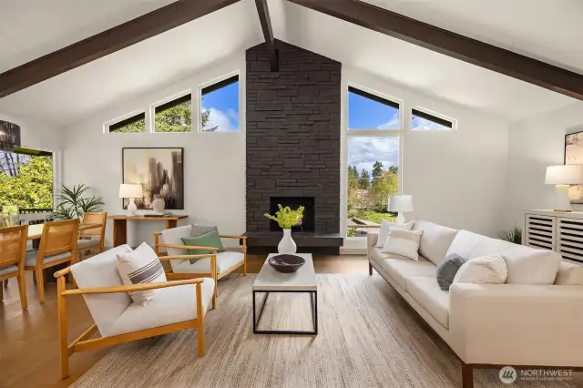 Imagine cozying up by this floor-ceiling fire on a chilly PNW night. A true luxury.